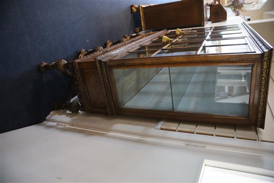 A 1930s Queen Anne revival walnut display cabinet, W.4ft 10in. D.1ft 4in. H.4ft 10.5in.